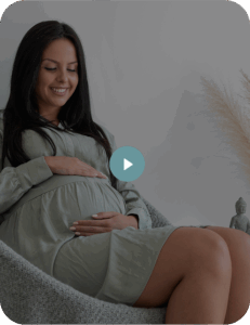 thumbnail of video of pregnant woman holding her tummy, smiling